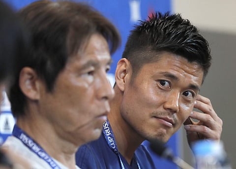 Japan's head coach Akira Nishino, left, and Japan goalkeeper Eiji Kawashima, right, attend the Japan's official press conference on the eve of the group H match between Poland and Japan at the Volgograd Arena the 2018 soccer World Cup in Volgograd. | AP