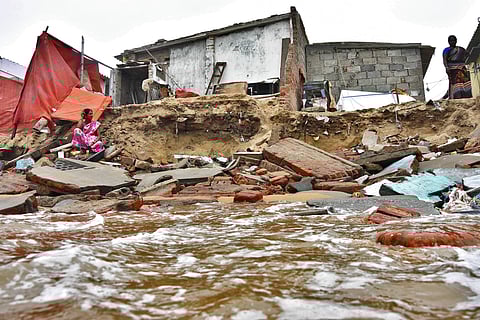 High tides damaged more than 50 houses at Foreshore Estate in Chennai. The waves went destructive during the early hours on Tuesday, leaving the fishermen community in distress. ( EPS | Ashwin Prasath)