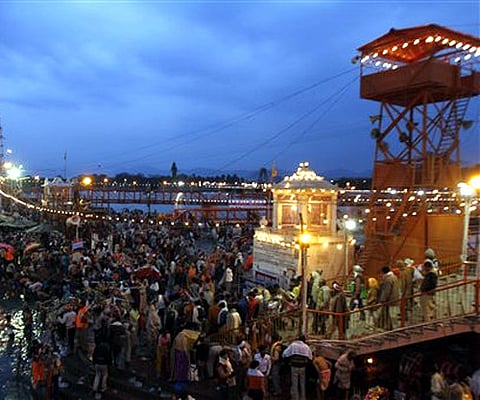 AP file image of Hindu pilgrims taking holy dip in the River Ganges as part of Kumbh Mela
