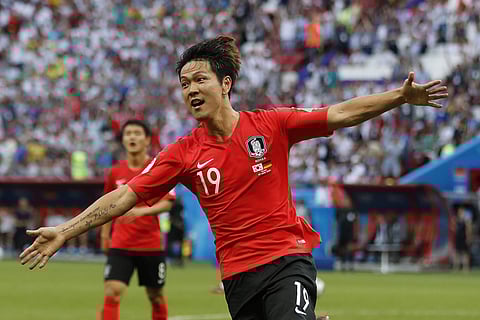 South Korea's Kim Young-gwon celebrates scoring his side's first goal during the group F match between South Korea and Germany, at the 2018 FIFA World Cup in the Kazan Arena in Kazan, Russia. (AP)