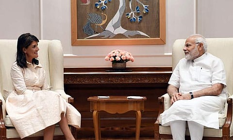 In this handout photograph released by India's Press Information Bureau (PIB) on June 27, 2018, US Ambassador to the United Nations Nikki Haley (L) and Indian Prime Minister Narendra Modi look on in New Delhi. (Photo: AFP)