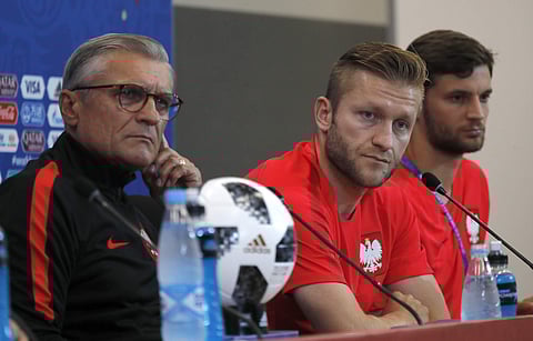 From left, Poland head coach Adam Nawalka, and Poland's Bartosz Bereszynski, attend Poland's official press conference. (File photo | AP)