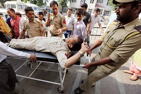 An injured policeman being taken for treatment after a ceasefire violation by Pakistan in Jammu on Sunday June 03 2018. | PTI