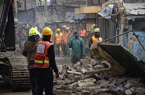 Rescuers work at the site of a five-storey collapsed building in the Huruma neighborhood of Nairobi, Kenya Sunday. (AP)