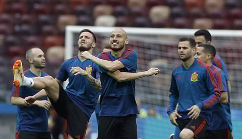 Spain's David Silva, center, exercises with teammates during Spain's official training ahead of the round of 16 match between Russia and Spain at the 2018 soccer World Cup at the Luzhniki Stadium in Moscow. | AP