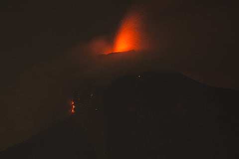 In this image taken with a long exposure, the Volcan de Fuego, or Volcano of Fire, spews molten rock from its crater in Alotenango, Guatemala, Sunday, June 3, 2018. (Photo | AP)