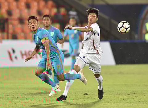 India player Sunil Chhetri Blue jersey no. 11 and Chinese Taipei player Ting-Yang Chen White jersey no. 3 vie for the ball during the Hero Intercontinental football Cup in Mumbai on Friday June 1 2018. | PTI