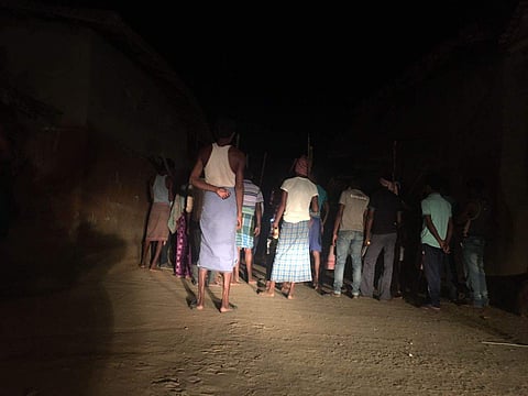 Members of an armed vigilante group guarding a village in Balarampur in Purulia district on Monday night. | Aishik Chanda