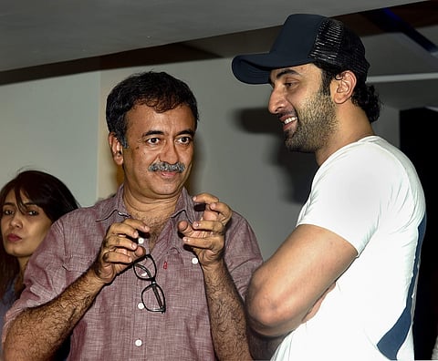Bollywood film director Rajkumar Hirani (L) with actor Ranbir Kapoor (File Photo | PTI)