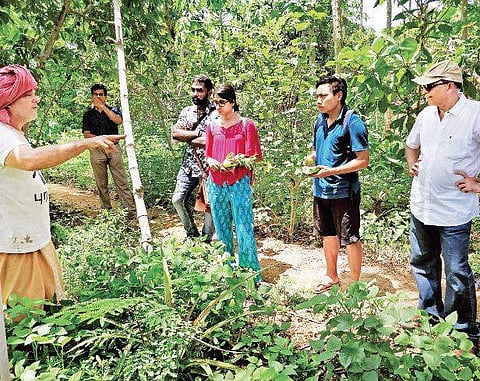 Madhuri and Bonnie. (Right) Visitors at Solitude Farm in Auroville during the food trail held by The Soul Window