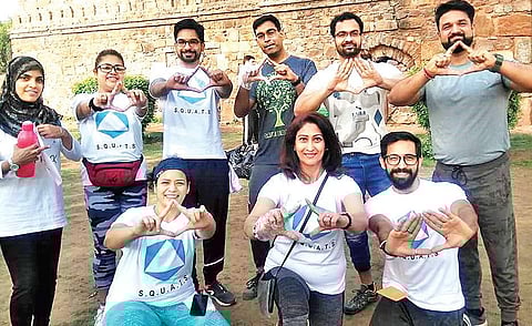 Shuchi Khanna (sitting, centre) with her plogging team