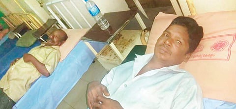 Fishermen P S Asokan and Josy Puthussery who were injured in the mid sea collision involving fishing boat Noha and cargo ship on Thursday