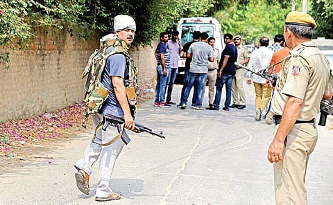 Delhi Police personnel at the encounter site in South Delhi's Chhatarpur on Saturday | parveen negi