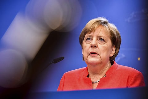 Chancellor Angela Merkel seeks to placate German rebels on migration