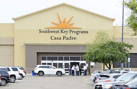 In this June 18, 2018 file photo, dignitaries take a tour of Southwest Key Programs Casa Padre, a U.S. immigration facility in Brownsville, Texas, where children who have been separated from their families are detained. (Photo | AP)