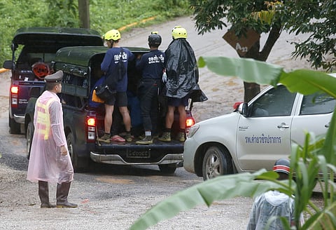 Rescuers move to the entrance to a cave complex where five stil lwere trapped in Mae Sai, Chiang Rai province, northern Thailand Tuesday, July 10, 2018. (Photo: AP)