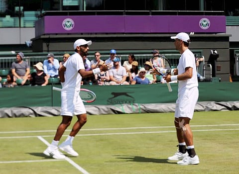 India's Divij Sharan (L) celebrates with his partner Artem Sitak after reaching the first ever Grand Slam quarterfinals of his career at the Wimbledon Championships in London. (Photo | PTI)