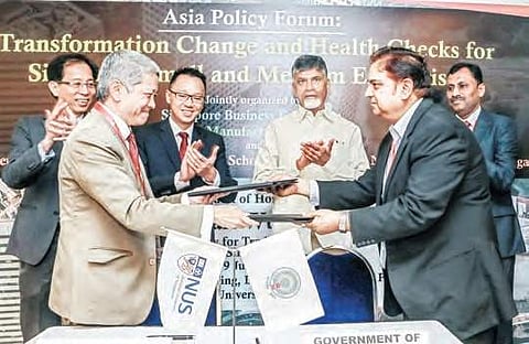 LKY School of Public Policy and AP government exchanging MoU in the presence of  CM N Chandrababu Naidu at Lee Kuan University in Singapore on Monday