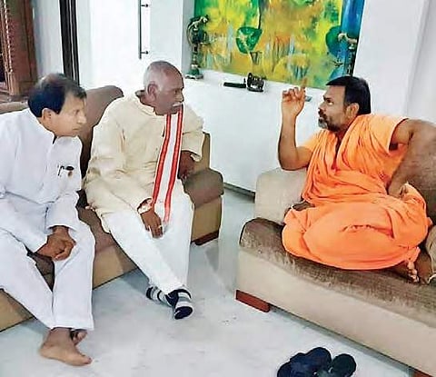 BJP MP Bandaru Dattatreya and MLA Chintala Ramachandra Reddy at the residence of Swamy Paripoornananda, at Jubilee Hills in  Hyderabad on Tuesday | Express