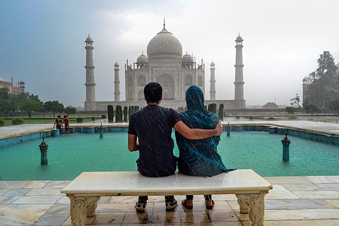 Visitors at the historic Taj Mahal in Agra on Wednesday July 11 2018. The Supreme Court on Wednesday slammed the Centre and its authorities for their 'lethargy' in taking steps to protect the Taj Mahal dubbing the issue of preserving the historic medieval