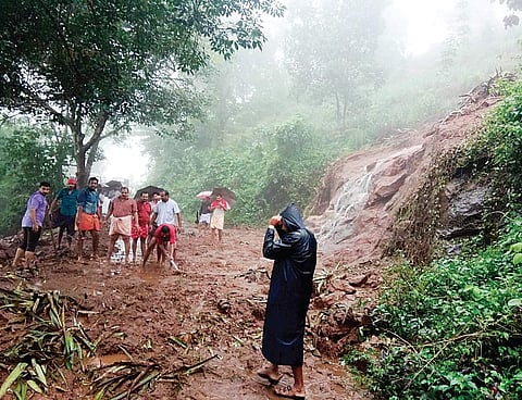 Traffic was disrupted for hours after tonnes of earth and boulders fell on the Moolamattam-Wagamon road at Edadu near Elappally on Wednesday | Express
