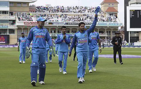 India's Kuldeep Yadav, center right, acknowledges the crowd at the end of the England innings during the first ODI between England and India at Trent Bridge, Nottingham, England (Photo | AP)