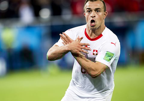 Switzerland's Xherdan Shaqiri celebrates after scoring his side's second goal during the group E match between Switzerland and Serbia at the 2018 soccer World Cup in the Kaliningrad Stadium in Kaliningrad. | AP