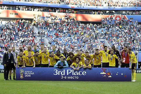 Team Belgium pose after the third place match between England and Belgium at the 2018 soccer World Cup in the St. Petersburg Stadium in St. Petersburg, Russia. | AP
