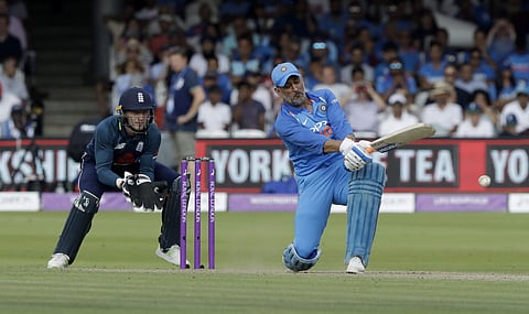 India wicketkeeper M.S. Dhoni hits a four during the second ODI between England and India at Lord's cricket ground in London, Saturday, July 14, 2018. | AP