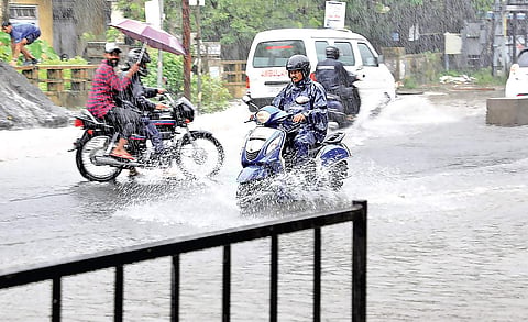 Motorists had a tough time negotiating the city’s flooded roads following the incessant rainfall on Sunday | Melton Antony