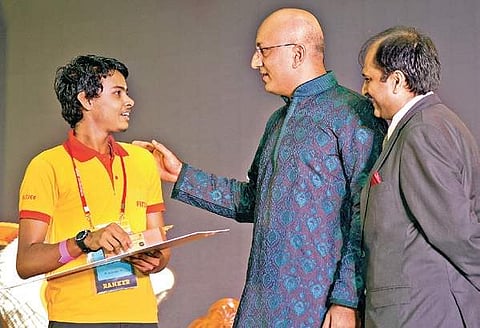 Nawabzada Mohammed Asif Ali, Dewan to Prince of Arcot, presenting FIITJEE Award to a student in Chennai on Sunday | Martin Louis