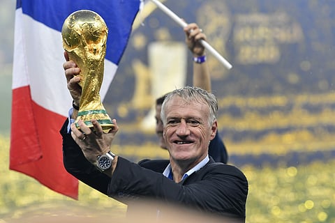 France head coach Didier Deschamps lifts the trophy after France beat Croatia by 4-2 during the final match between France and Croatia at the 2018 soccer World Cup in the Luzhniki Stadium in Moscow. | AP