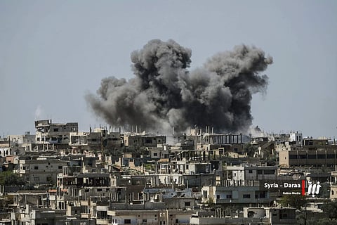 Smoke rising over buildings in Daraa province (Photo | AP)
