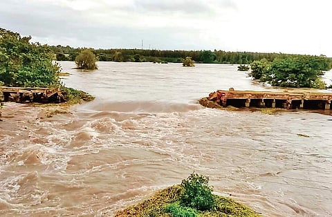The Wellesley Bridge across the Cauvery near Sathyagala in Kollegal taluk was washed away on Monday