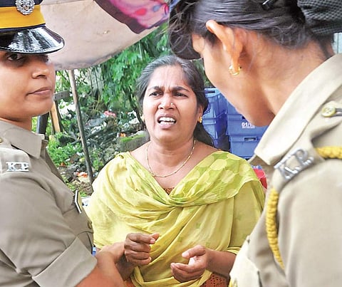 Preetha Shaji being taken into custody on Tuesday
