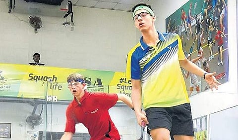 Players from Zimbabwe and Colombia in action during the WSF World Junior Squash Championship in Chennai on Wednesday.  (Martin Louis | EPS)