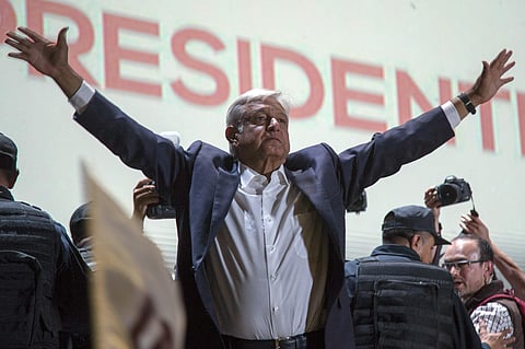 Anti-establishment leftist Andres Manuel Lopez Obrador swept to victory in Mexico's presidential election on Sunday. winning 53 percent of the vote. It is the first time in Mexico's modern history a candidate has won more than half the vote in a competitive election. IN PIC: Presidential candidate Andres Manuel Lopez Obrador acknowledges his supporters as he arrives to Mexico City's main square, the Zocalo. (Photo | AP)