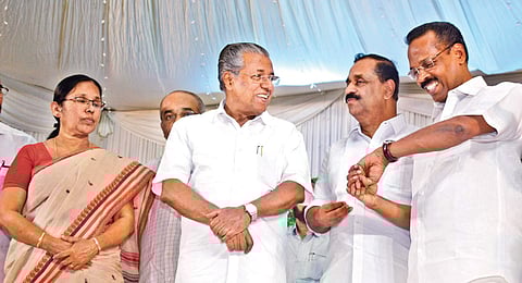 Chief Minister Pinarayi Vijayan shares a light moment with Cabinet colleagues K K Shylaja and T P Ramakrishnan and Mayor Thottathil Raveendran after inaugurating a felicitation function organised by the Kozhikode Corporation on Sunday to honour the heroes