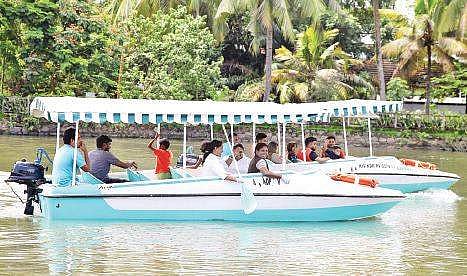 Members of Le Meridien collecting plastic waste from the backwaters