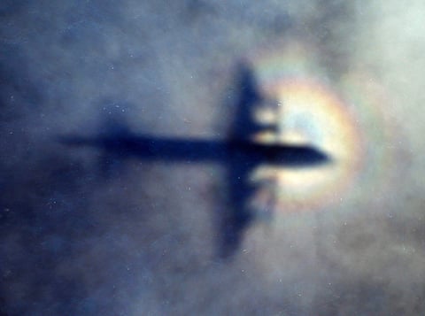 In this March 31, 2014 file photo, the shadow of a Royal New Zealand Air Force P3 Orion is seen on low level cloud while the aircraft searches for missing Malaysia Airlines Flight MH370 in the southern Indian Ocean. (Photo | AP)