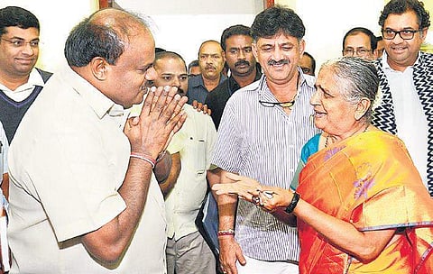 Chief Minister H D Kumaraswamy greets Infosys Foundation Chairperson  Sudha Murty in Bengaluru on Thrusday | Pushkar V