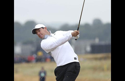 Rory McIlroy of Northern Ireland plays out of the rough on the 2nd hole during the second round of the British Open Golf Championship in Carnoustie, Scotland. | AP