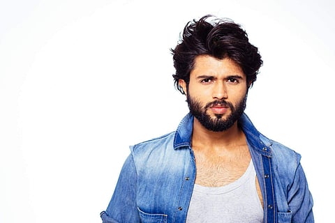 Vijay Deverakonda's shirtless pictures on the hoardings and social media did make people wonder if those toned arms and chiselled abs were worked out for the Rowdy photo series or for a role in a movie.  (Photo | Facebook)