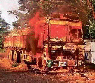 Locals set the vehicle on the fire and blocked the highway demanding adequate compensation and an underpass at the accident spot. (Photo |EPS)