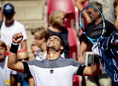 Fabio Fognini of Italy reacts after winning against Fernando Verdasco of Spain, during their semifinal match in the Swedish Open tennis tournament in Bastad. | AP