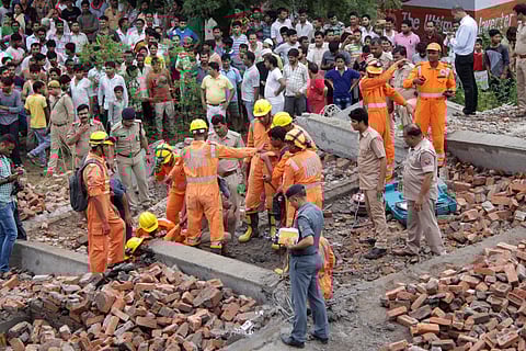 Rescue works underway after an under-construction building collapsed at Masuri in Ghaziabad on Sunday July 22 2018. | PTI