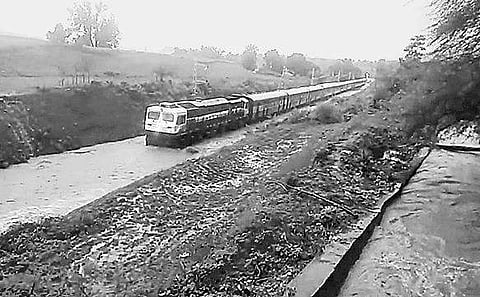 Bhubaneswar-Jagdalpur Hirakhand Express stranded at Bhalumaska in Rayagada district as railway tracks got submerged in flood water I Express