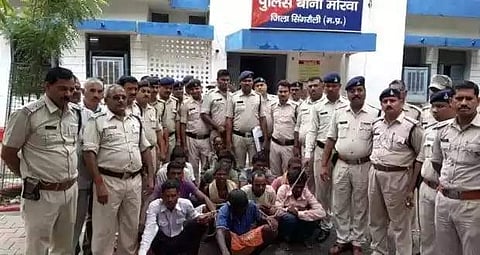 Eleven out of the 14 men arrested by police for lynching the mentally challenged woman after suspecting her to be a child lifter on Thursday night in jungles of Madhya Pradesh's Singrauli district. | Express Photo Services