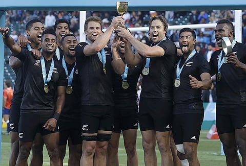 New Zealand players celebrate after beating England in the Rugby Sevens World Cup championship final in San Francisco. (Photo | AP)