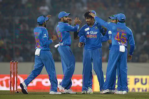 India’s Jasprit Bumrah, center, celebrates with his teammates after the dismissal of Bangladesh’s Soumya Sarkar during the Asia Cup  | File AP